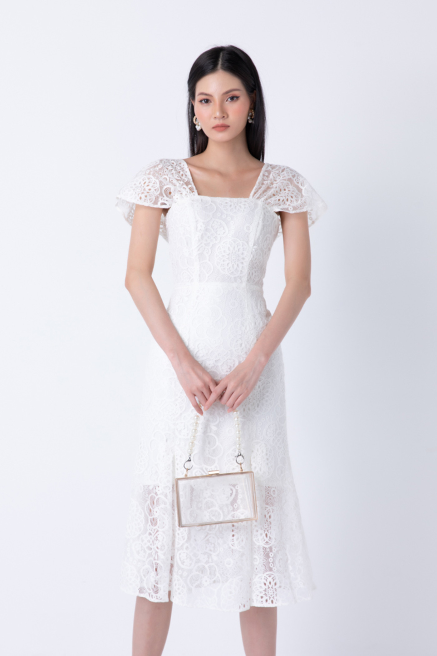 Đầm ren dập nổi dáng đuôi cá 