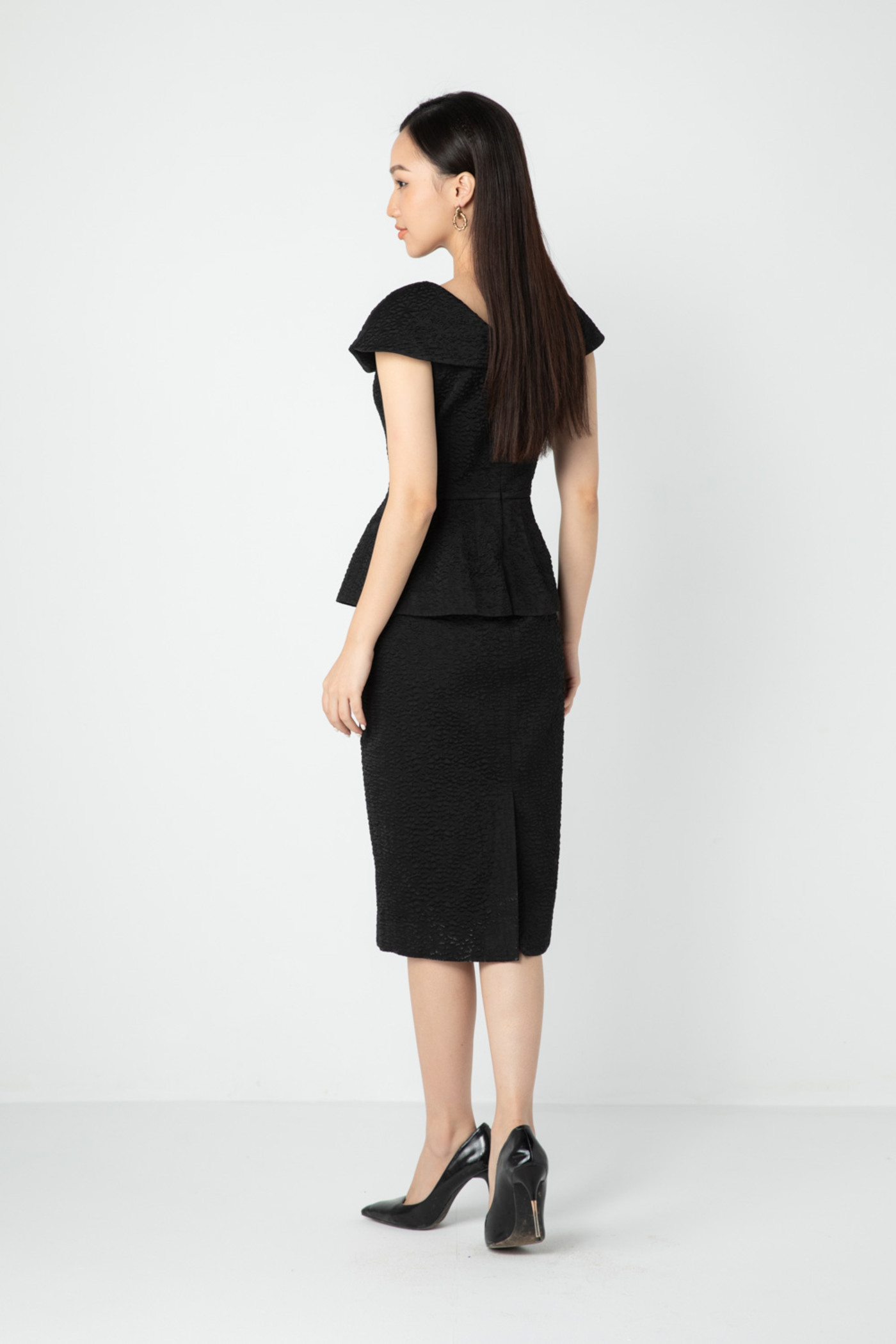 Đầm peplum dập nổi 