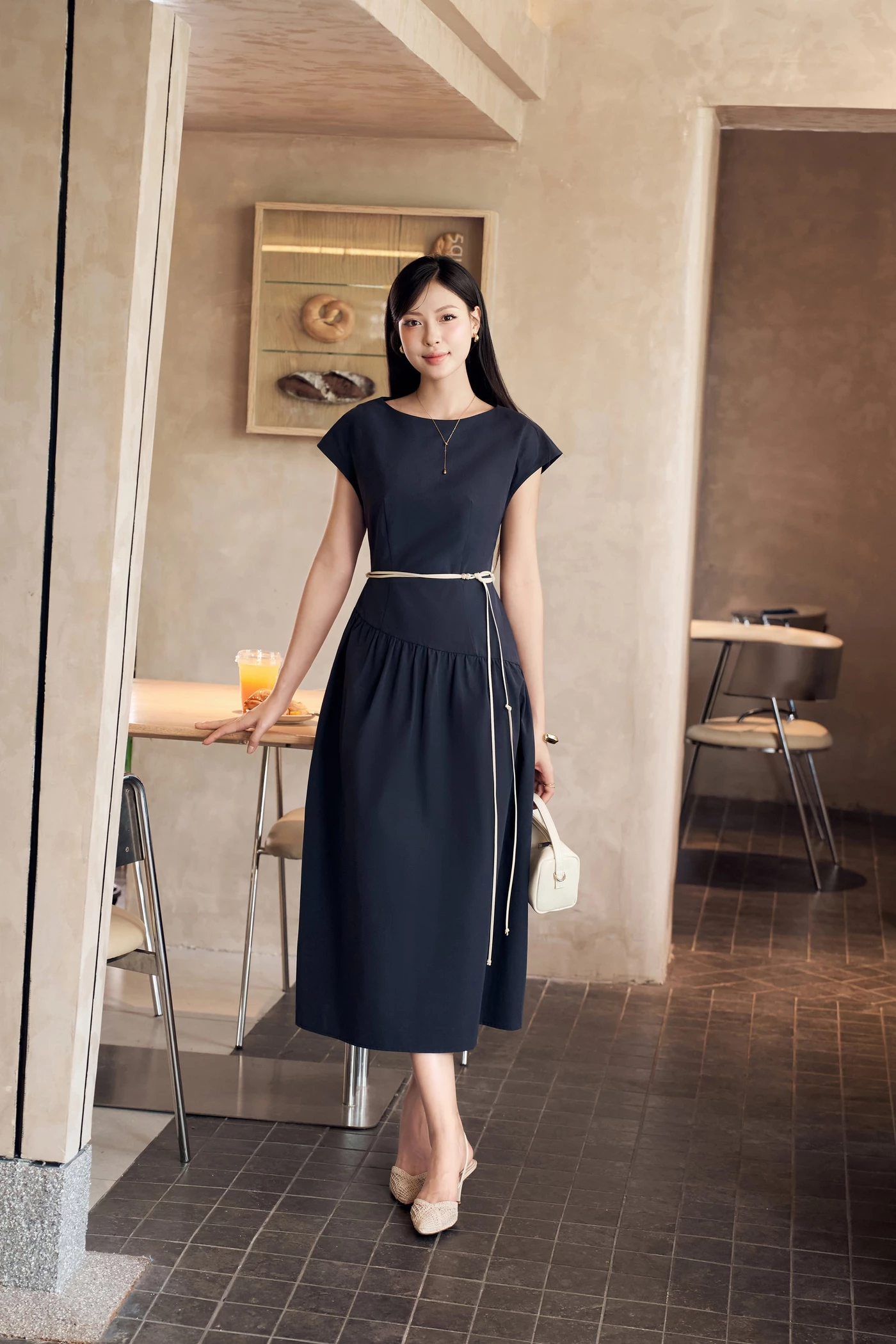 Đầm xòe tay hến Elysia