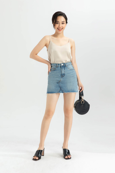 Chân váy bò chữ A gấu xổ chỉ