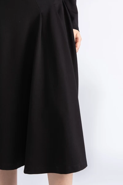 Đầm thun xòe cổ chéo