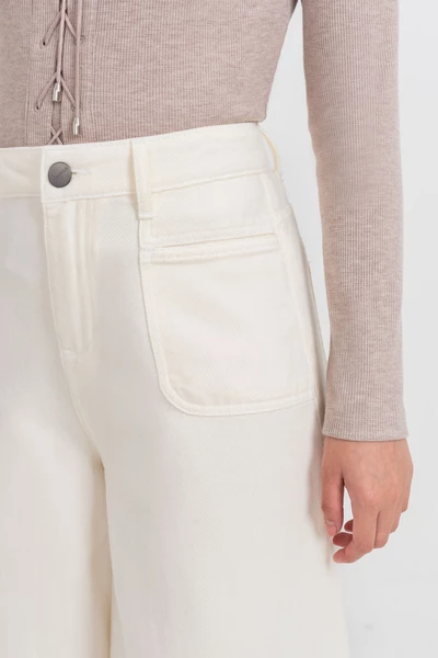 Cream Jeans - Quần Jeans ống loe